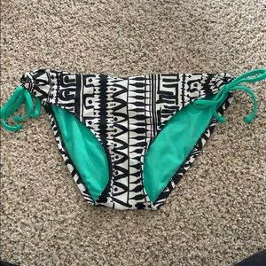 Geometric bikini bottom; black, white, and green